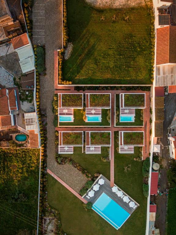 an overhead view of a house with a swimming pool at Ericeira Prime Villas in Ericeira