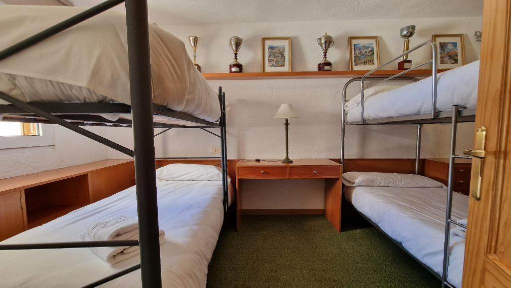 Posteľ alebo postele v izbe v ubytovaní IMEDA Casa 6 Estrellas
