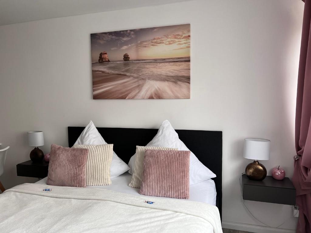Postel nebo postele na pokoji v ubytování Sophie Flair Apartment