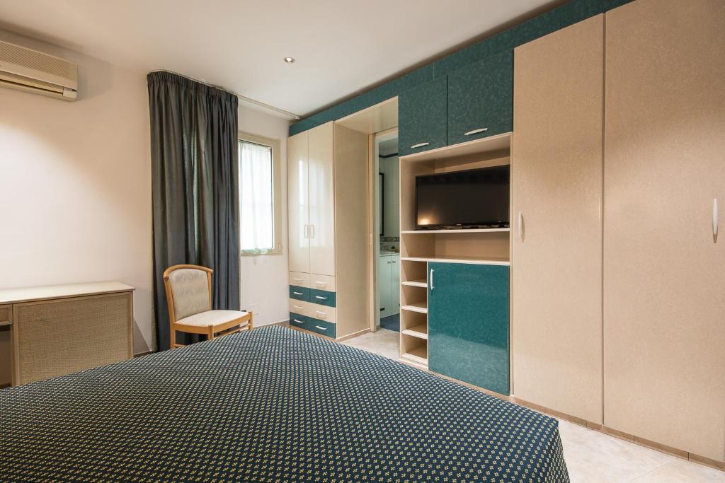 Postel nebo postele na pokoji v ubytování HOTEL SOLE