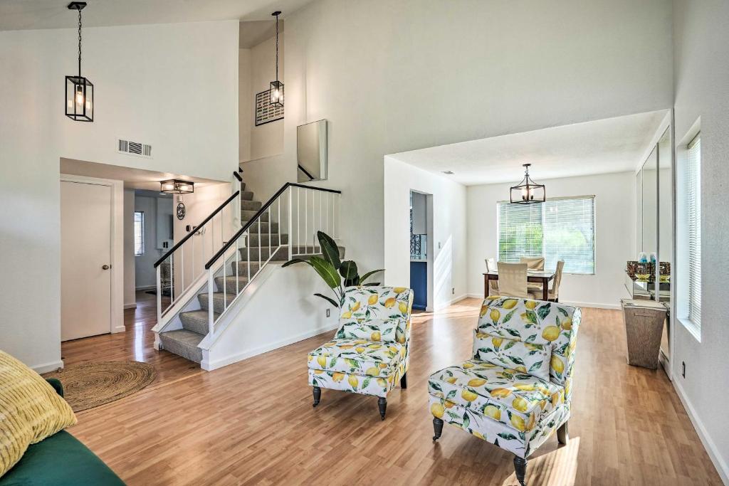 een woonkamer met 2 stoelen en een trap bij Bay Area Home Rental Near Six Flags and Napa Valley! in Vallejo