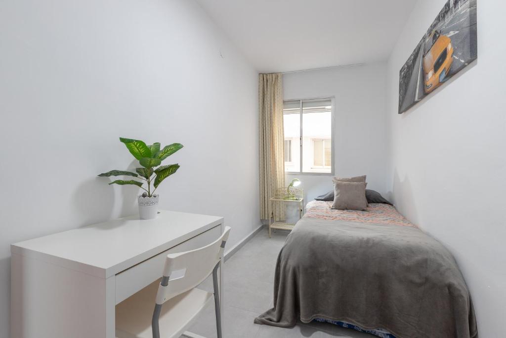 Posteľ alebo postele v izbe v ubytovaní Apartamento con terraza centrico