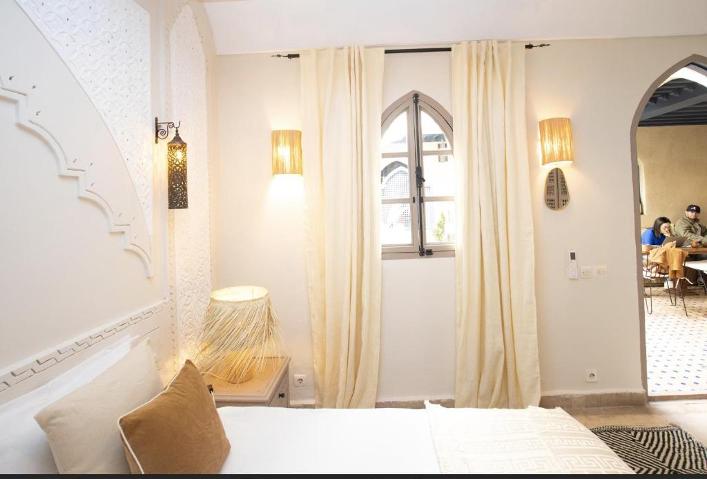 Postel nebo postele na pokoji v ubytování Riad Jonan & Spa