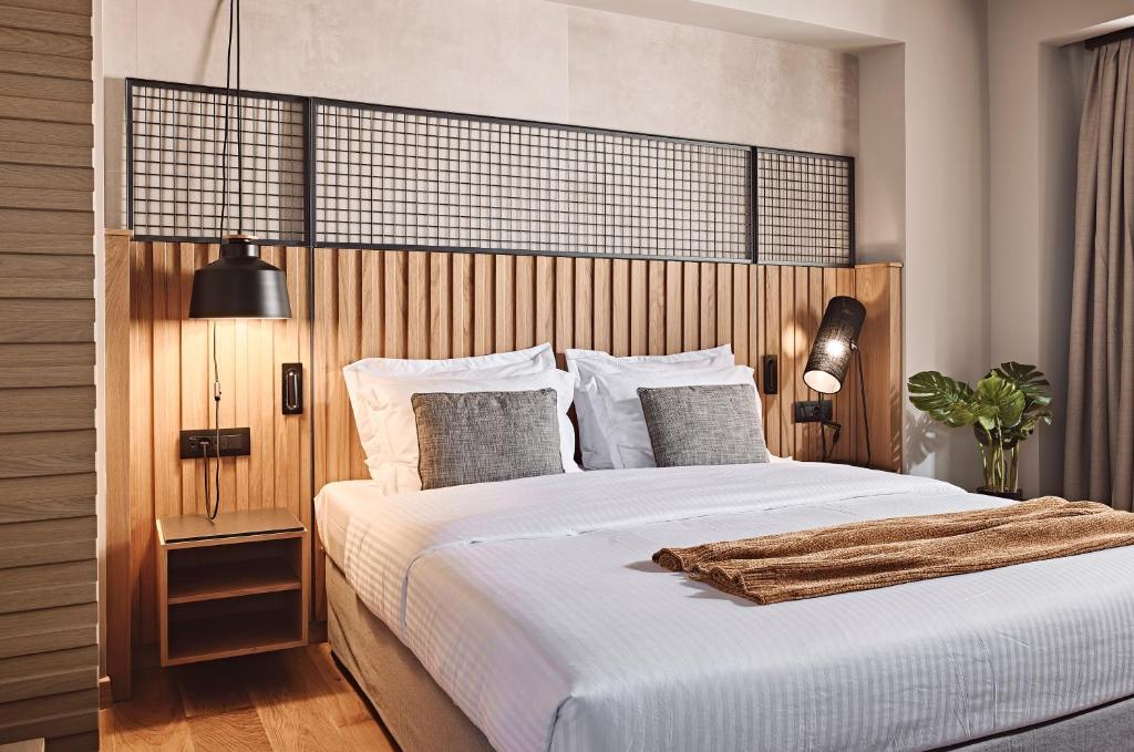 Postel nebo postele na pokoji v ubytování Cama Luxury Suites Glyfada