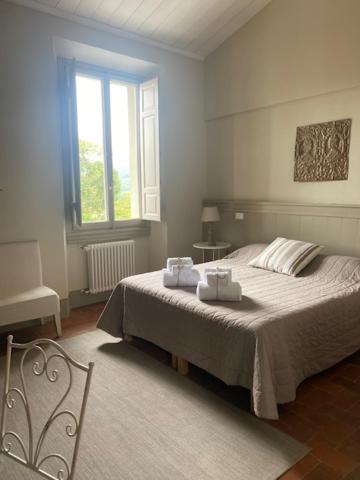 Кровать или кровати в номере Sosta al Capitano