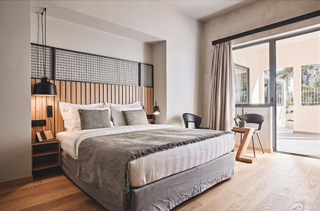 Postel nebo postele na pokoji v ubytování Cama Luxury Suites Glyfada