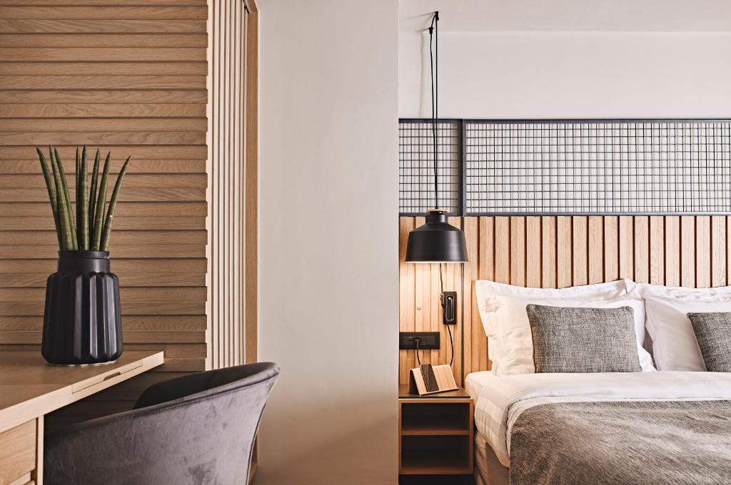 Postel nebo postele na pokoji v ubytování Cama Luxury Suites Glyfada