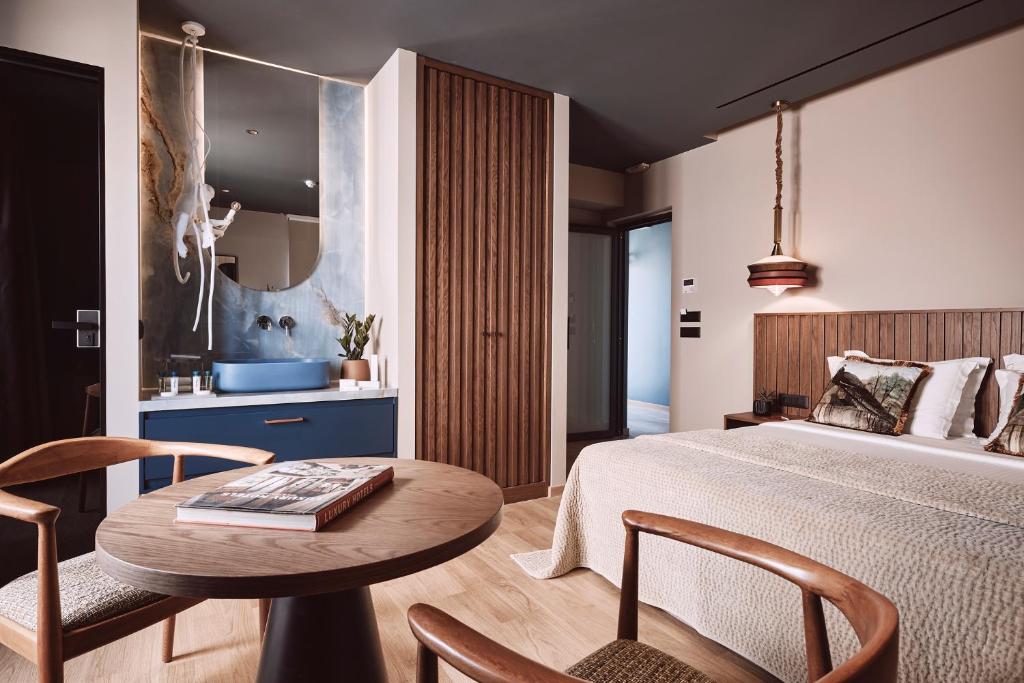 Postel nebo postele na pokoji v ubytování Cama Luxury Suites Glyfada