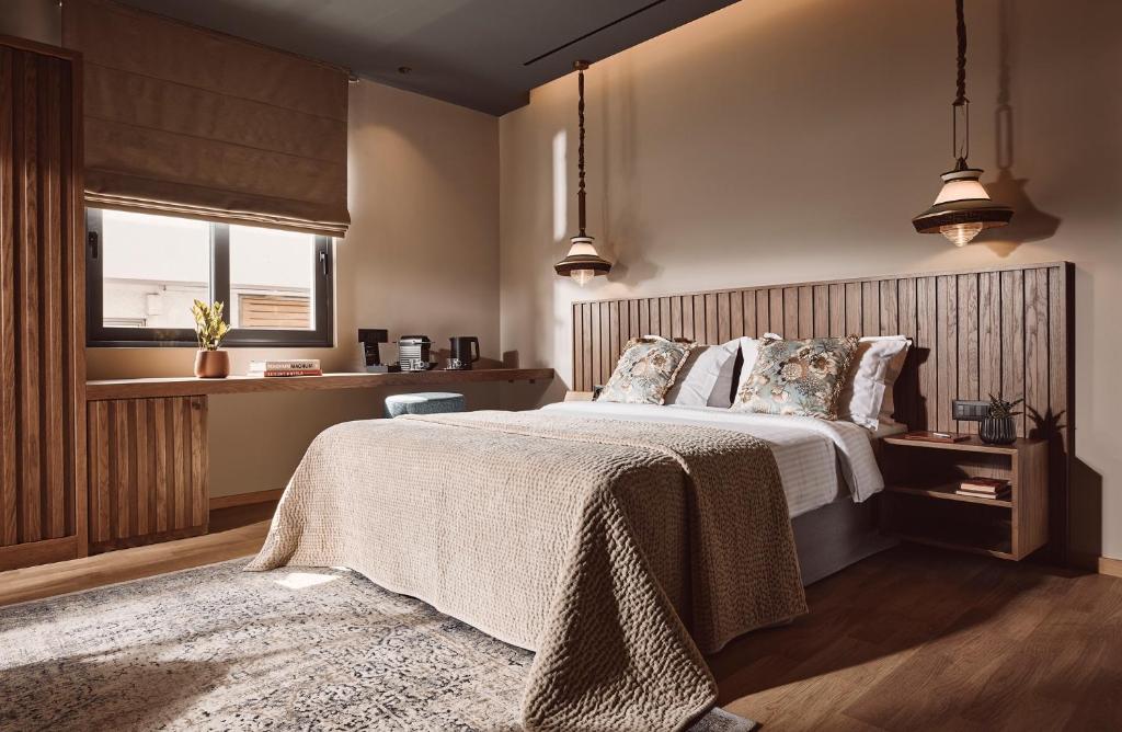 Postel nebo postele na pokoji v ubytování Cama Luxury Suites Glyfada
