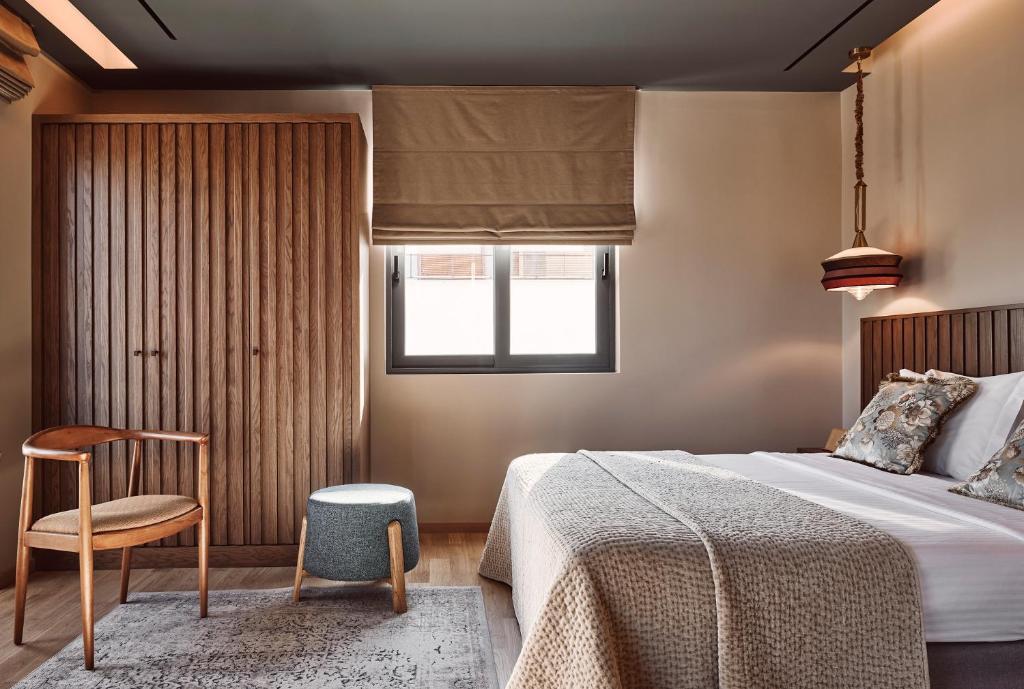 Postel nebo postele na pokoji v ubytování Cama Luxury Suites Glyfada