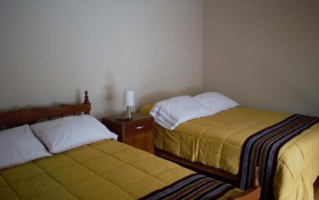 Postel nebo postele na pokoji v ubytování Casa Pablo