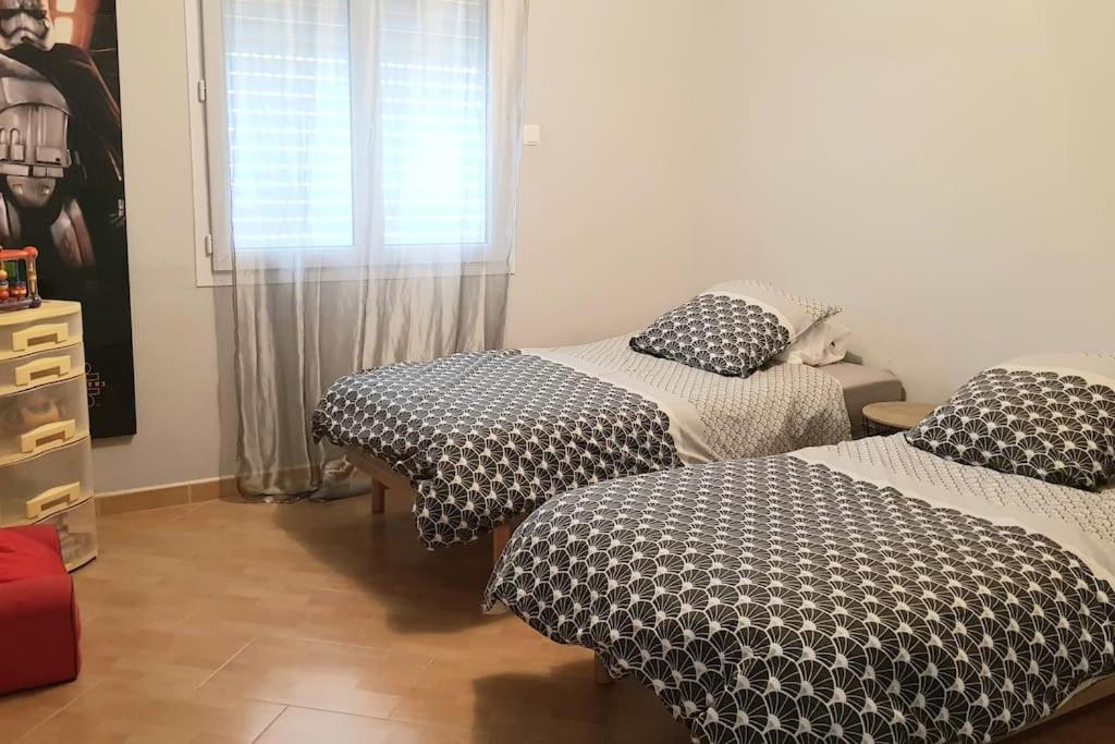 Posteľ alebo postele v izbe v ubytovaní SAINT MICHEL