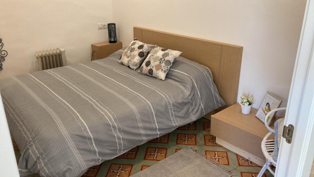 Postel nebo postele na pokoji v ubytování Casa de l'hort - Els Valentins