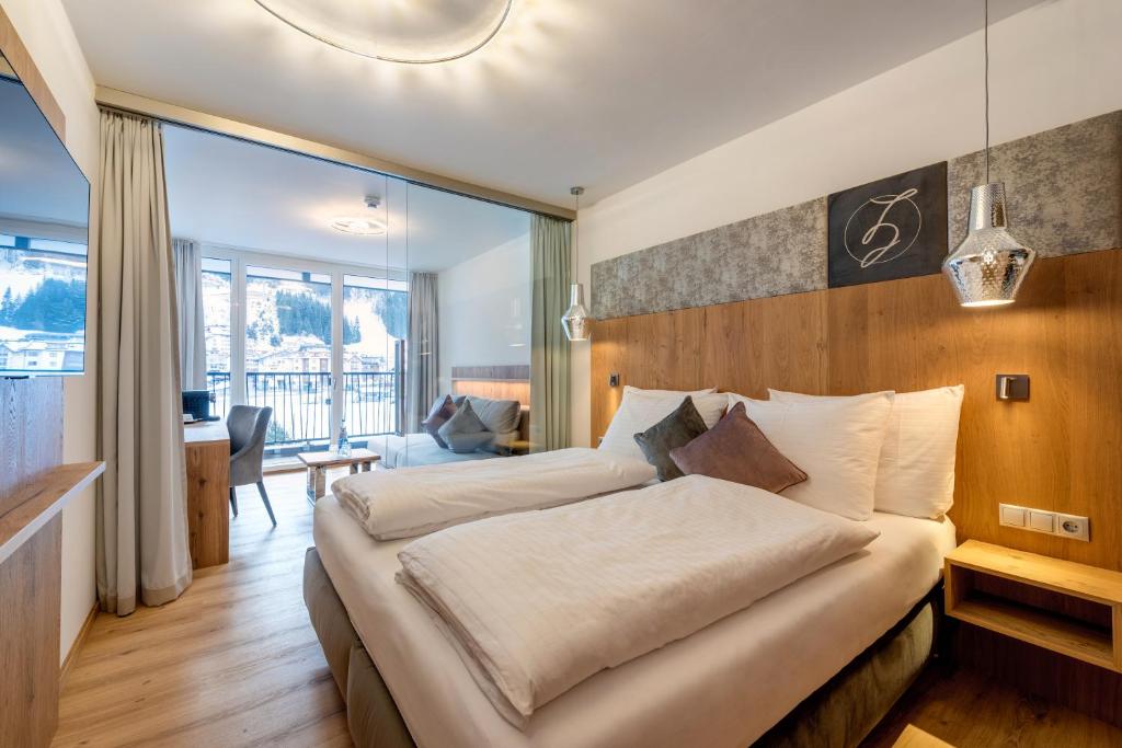 Postel nebo postele na pokoji v ubytování Hotel Zalwonder