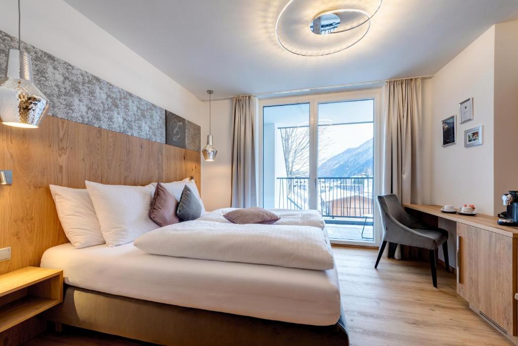 Postel nebo postele na pokoji v ubytování Hotel Zalwonder