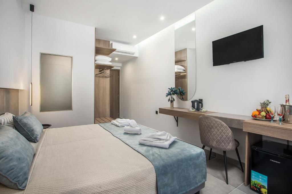 Posteľ alebo postele v izbe v ubytovaní FRESH HOTEL FALIRAKI