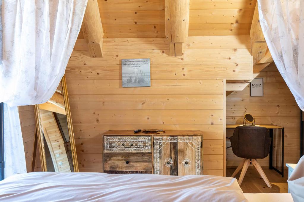 Postel nebo postele na pokoji v ubytování Biochalet Haus 1