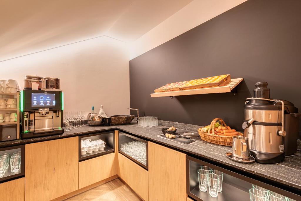 Kuchyň nebo kuchyňský kout v ubytování Hotel Zalwonder