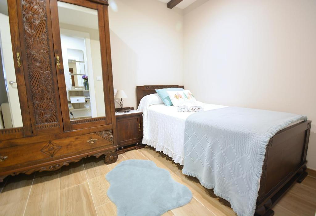 Postel nebo postele na pokoji v ubytování GALIHOST - A Casa das Barreiras