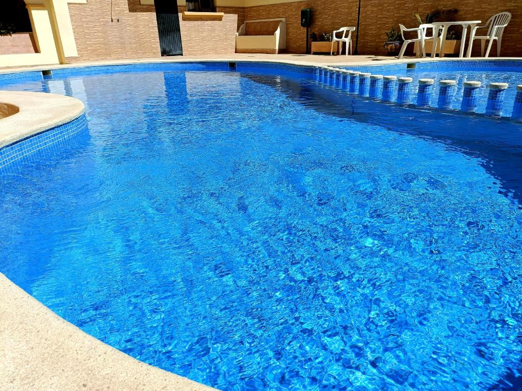 Bazén v ubytovaní Apartament Casa Milo playa Los Locos alebo v jeho blízkosti