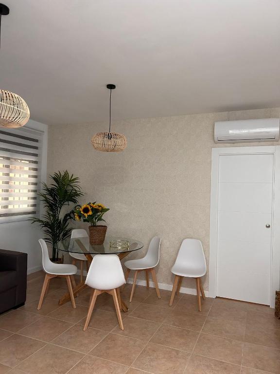 Posedenie v ubytovaní Apartamentos Esencia