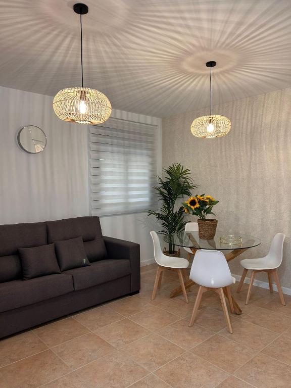 Posedenie v ubytovaní Apartamentos Esencia