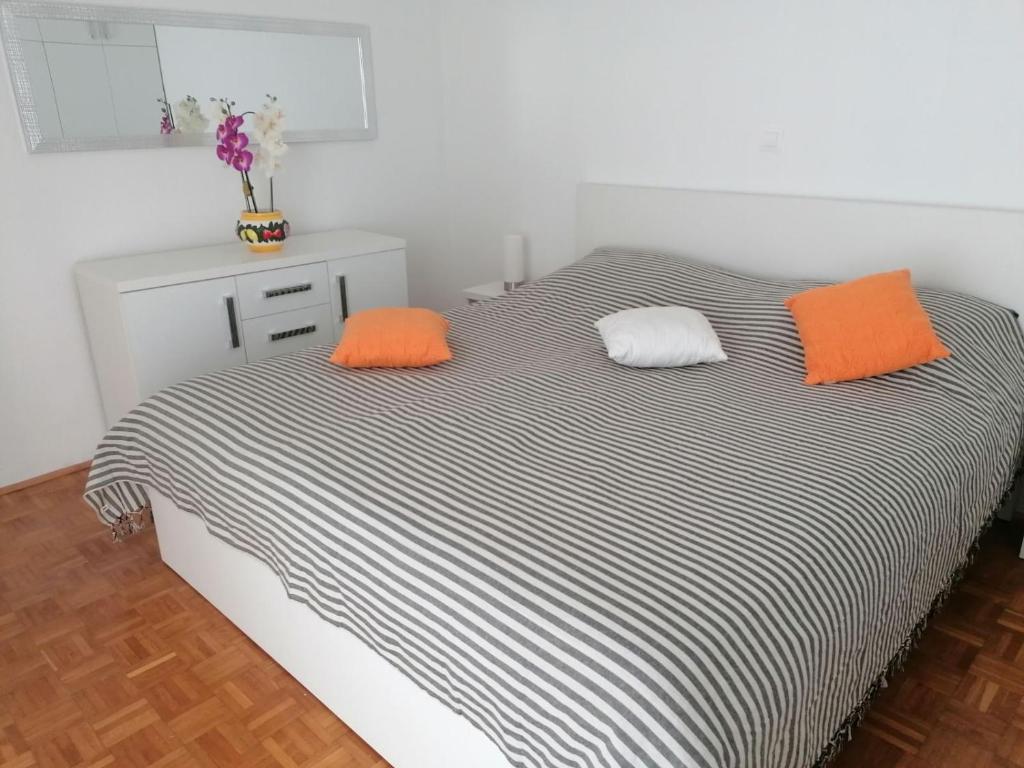 Postel nebo postele na pokoji v ubytování Apartman Petra