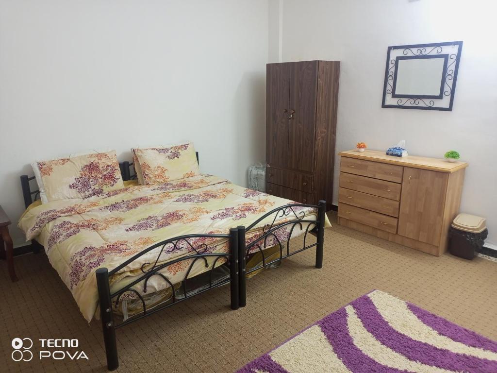Кровать или кровати в номере Baiet AL-Deafah Guest house