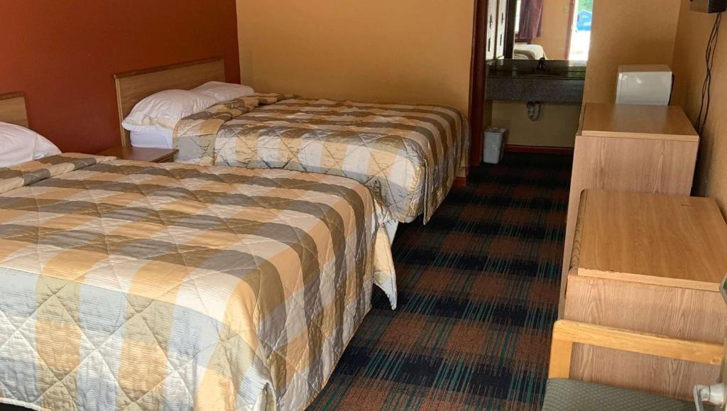 Luxury Inn Forrest City - Habitación De La Reina