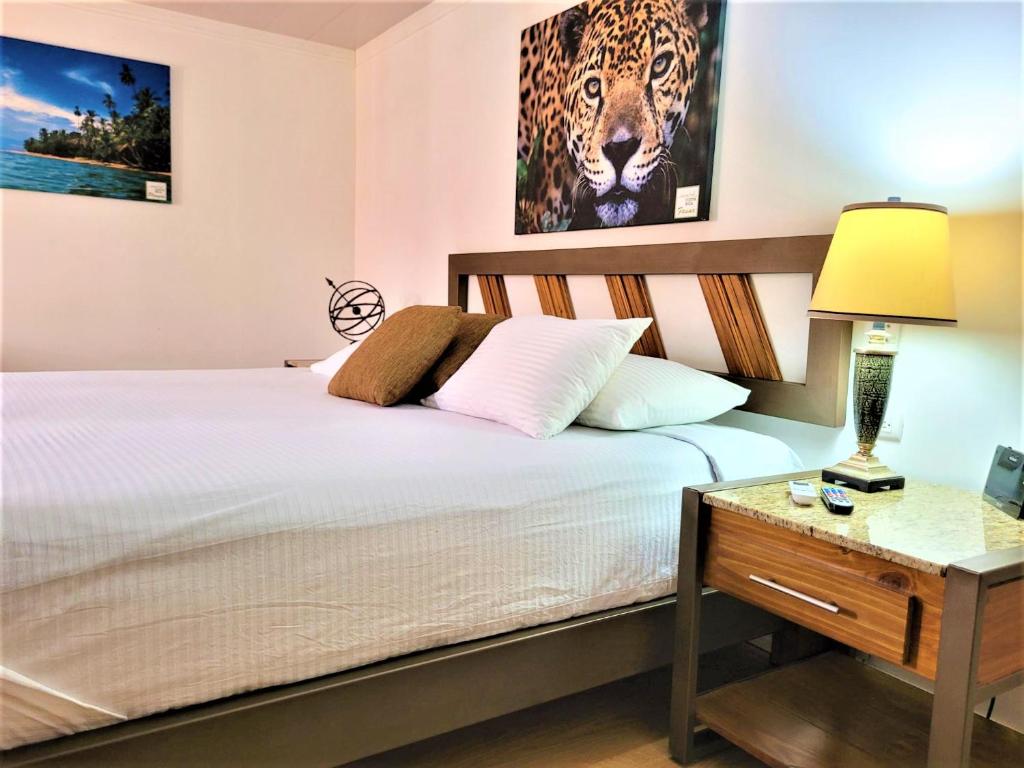 Postel nebo postele na pokoji v ubytování Hotel Zima