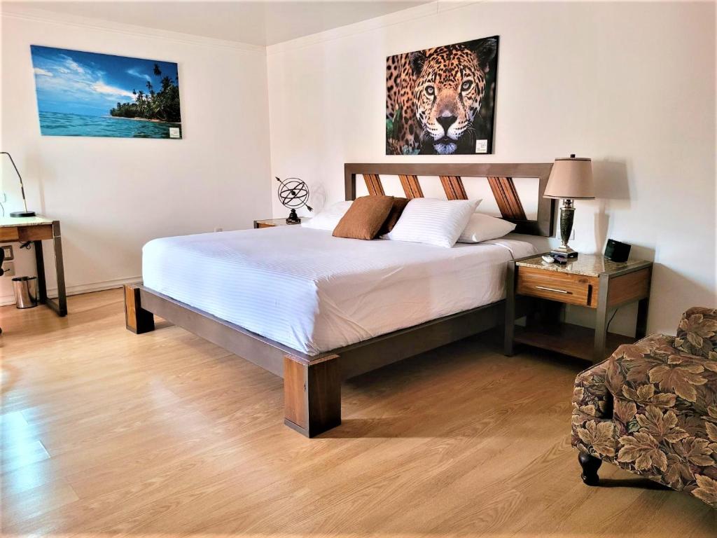 Postel nebo postele na pokoji v ubytování Hotel Zima