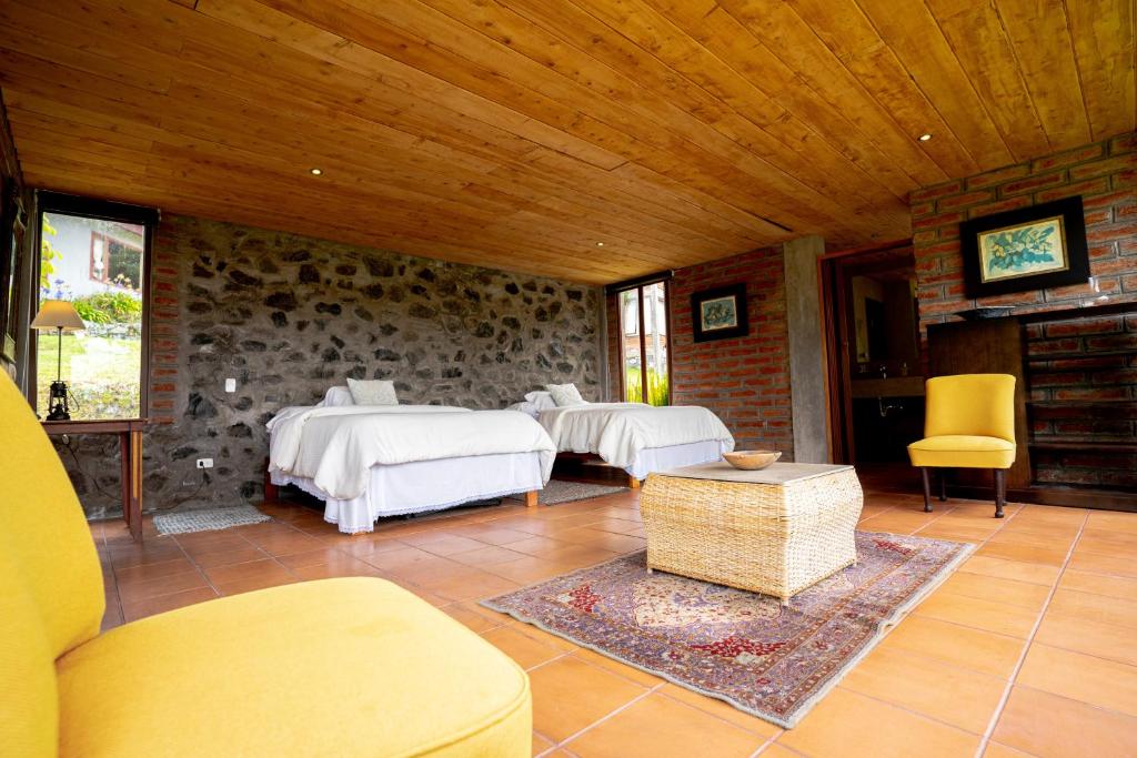 Posezení v ubytování Nalanda Casa de Montaña