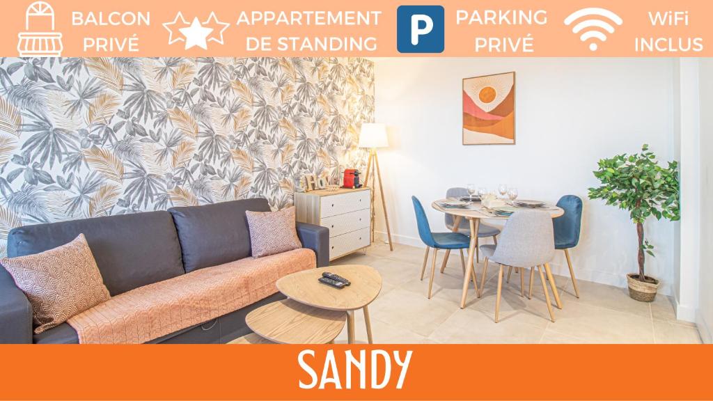 a living room with a couch and a table at ZenBNB / Sandy / Parking privé / 5 pers. / Géant / in Annemasse