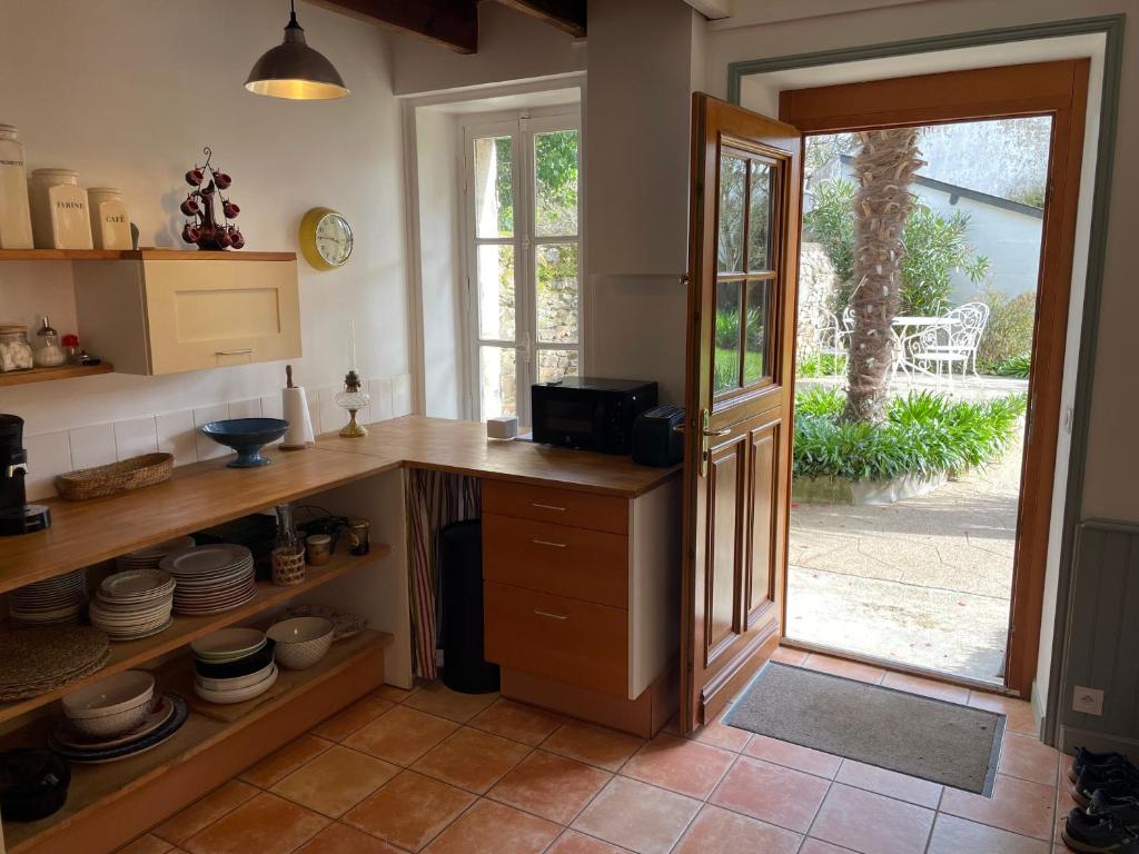 Kuchyňa alebo kuchynka v ubytovaní La Maison Verte a Etables sur Mer