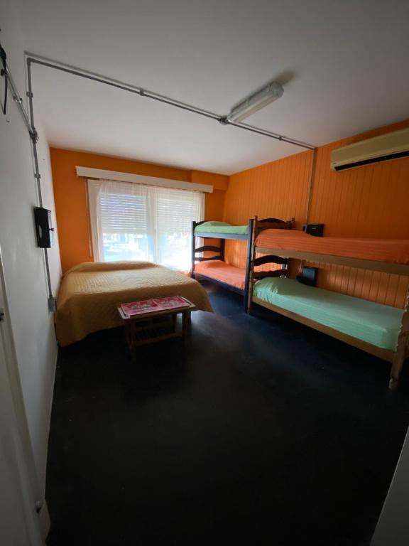 Postel nebo postele na pokoji v ubytování Hostel del Puerto