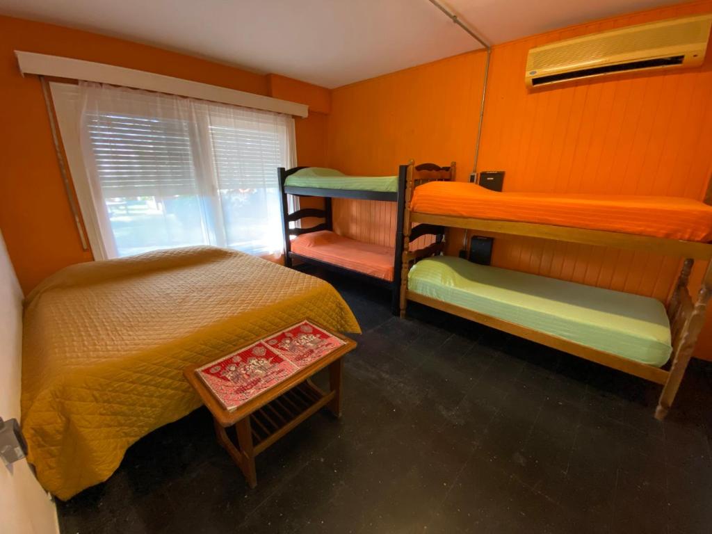 Postel nebo postele na pokoji v ubytování Hostel del Puerto