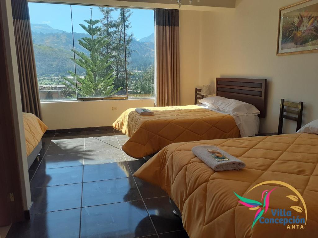Postel nebo postele na pokoji v ubytování Villa Concepción Lodge