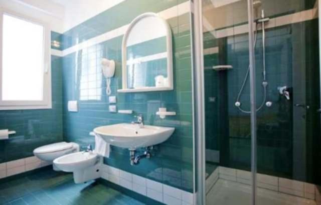 Koupelna v ubytování Hotel Raffaello