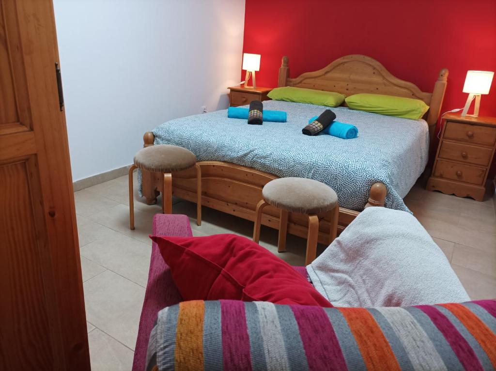 Postel nebo postele na pokoji v ubytování La Villa Calypso - Vivienda Vacacional con Piscina Privada