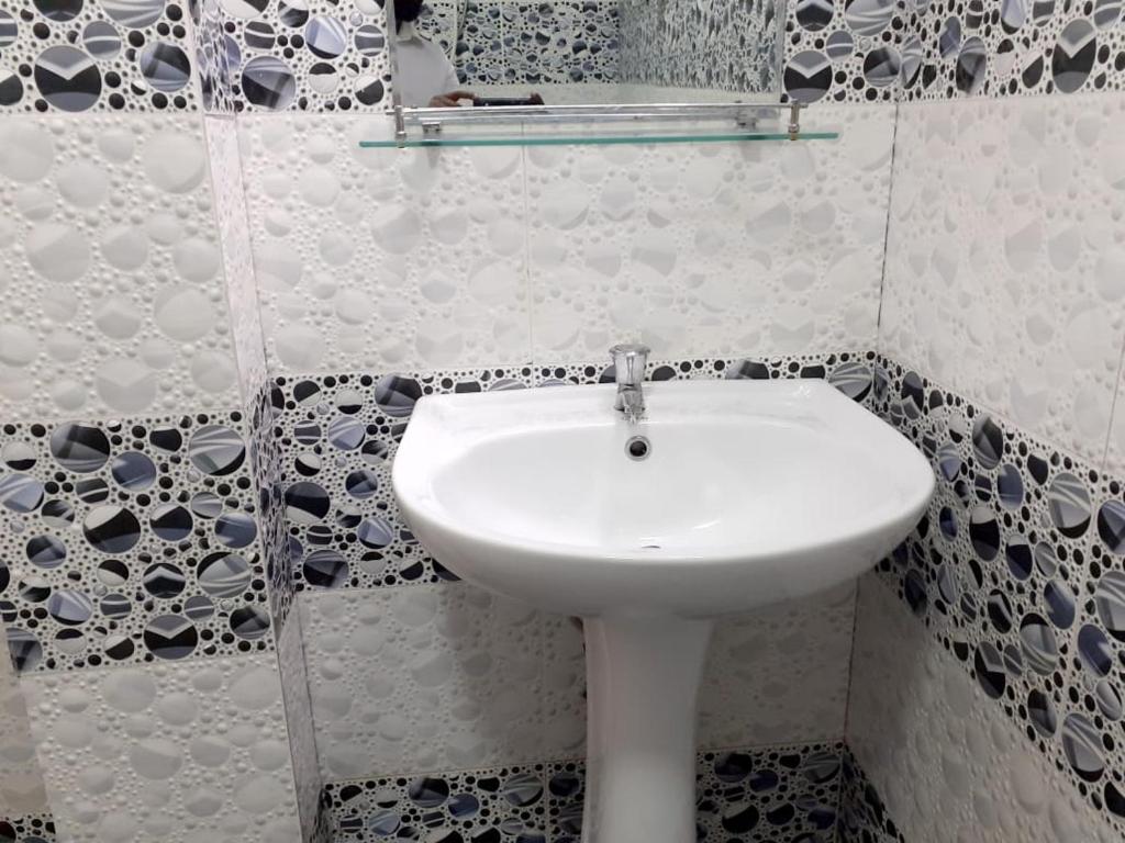 Koupelna v ubytování Subash Hotel