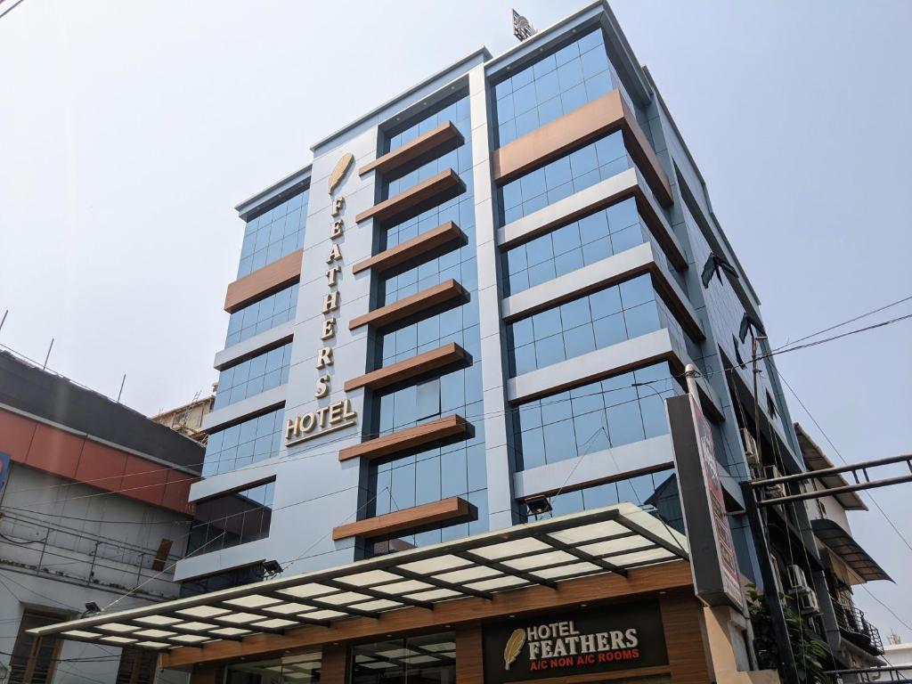 uma representação do edifício de reforços do hotel em Hotel Feathers em Ernakulam