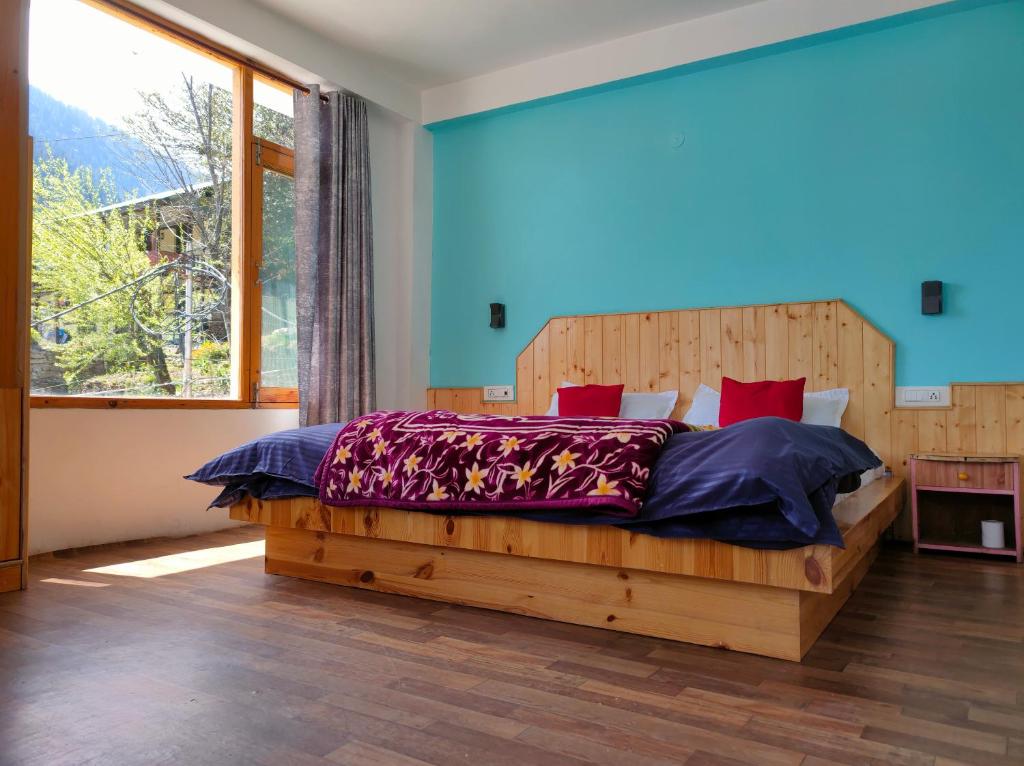 Postel nebo postele na pokoji v ubytování Bros Hostel & Yaara Cafe