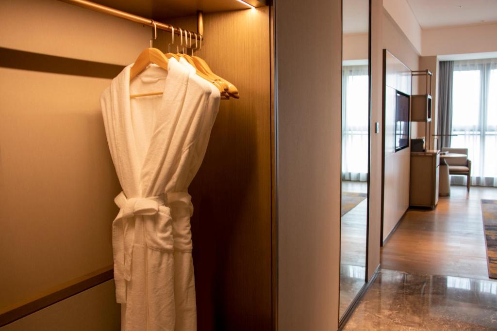 Fotografie z fotogalerie ubytování Guangzhou Pazhou LN DongFang Hotel-Free shuttle between hotel and Exhibition Center during Canton Fair & Exhibitor Registration Counter v Kantonu