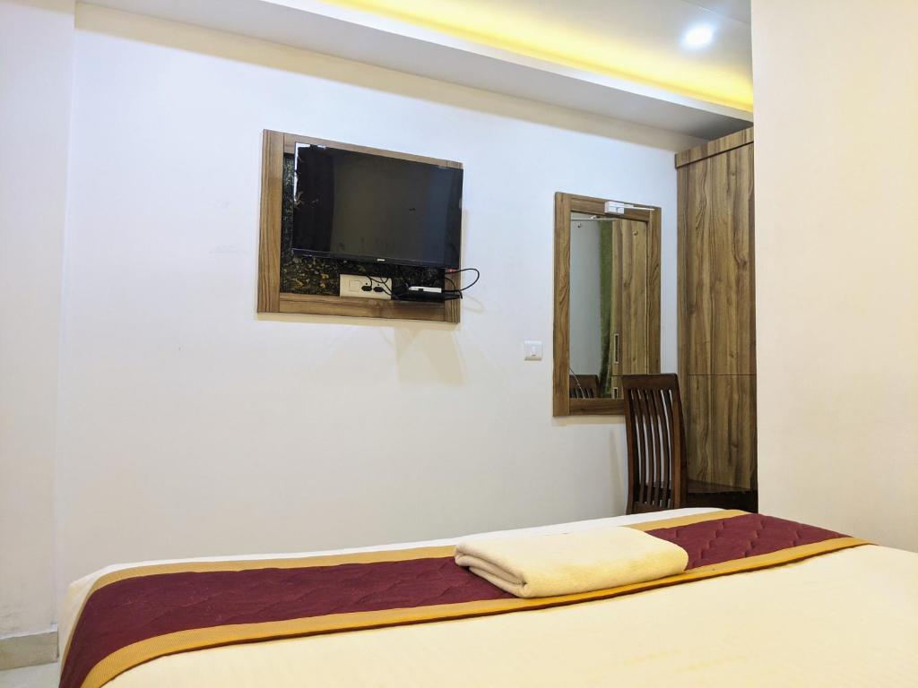 TV a/nebo společenská místnost v ubytování Hotel Feathers