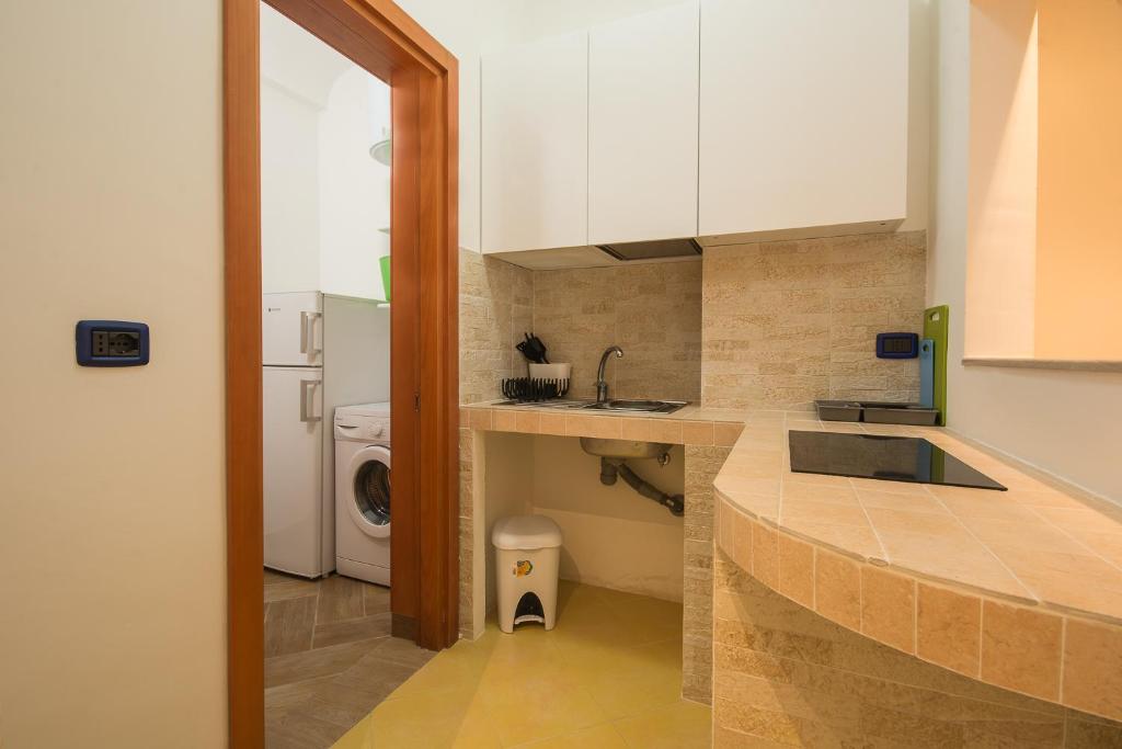 Kuchyň nebo kuchyňský kout v ubytování HOTEL SOLE