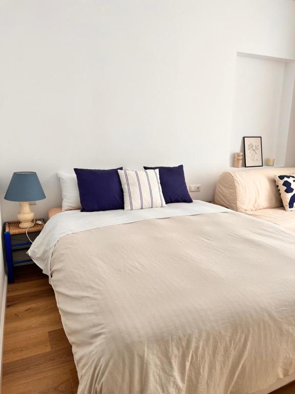 Letto o letti in una camera di ADI BOUTIQUE HOUSE