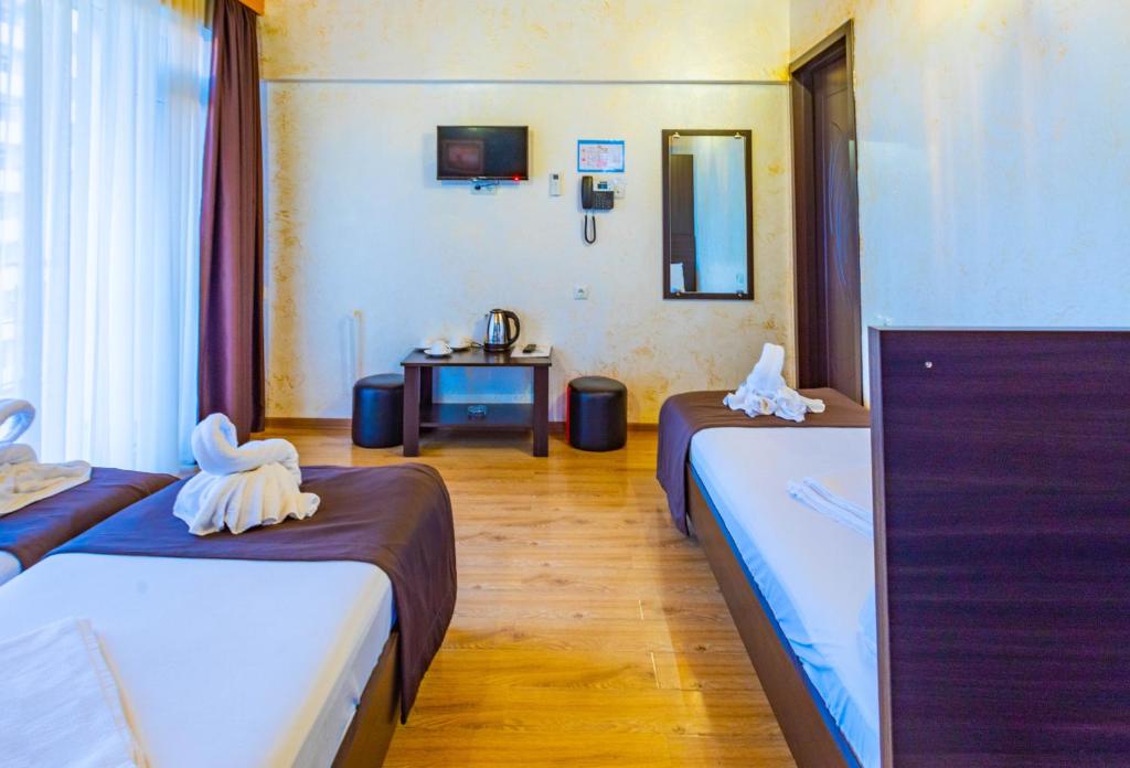 Postel nebo postele na pokoji v ubytování Beach House