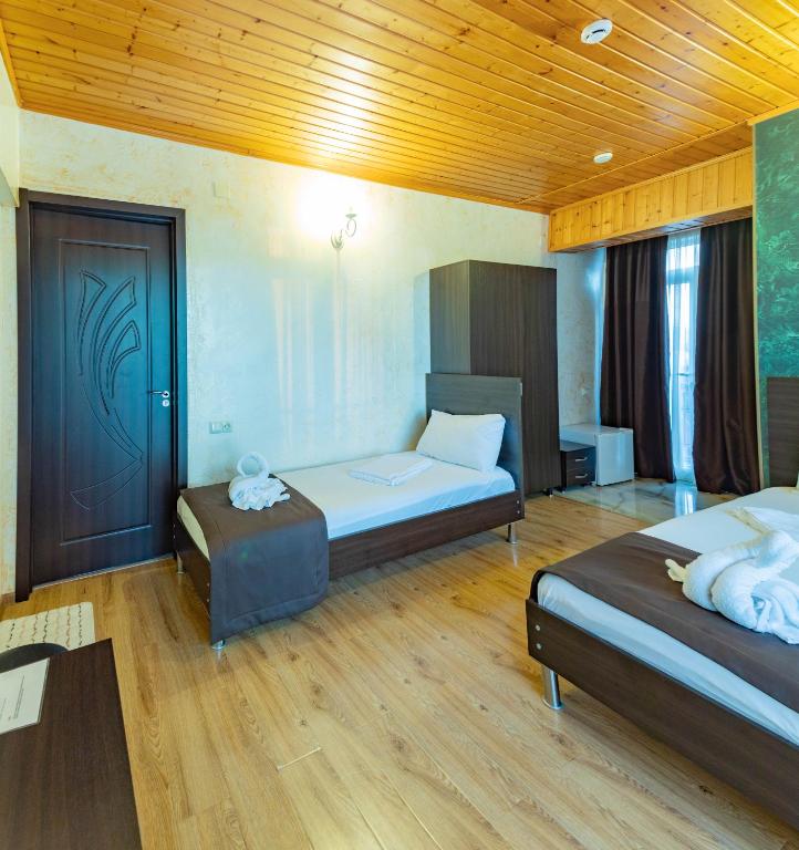 Postel nebo postele na pokoji v ubytování Beach House