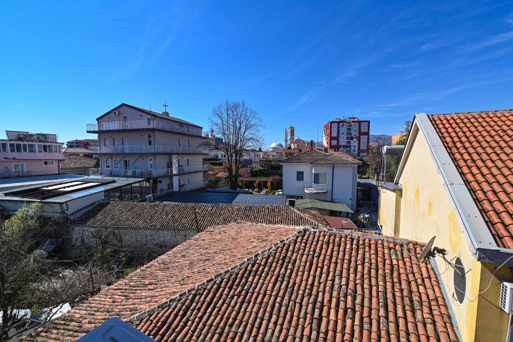 a view of roofs of buildings in a city at Hotel Epoka in Shkodër