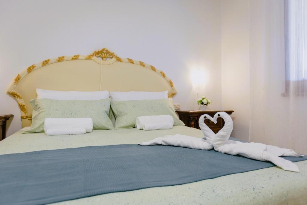 Postel nebo postele na pokoji v ubytování Casa da Maddalena e Andrea